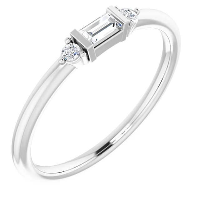 Delicate Fusion Stackable Ring a refined and graceful piece that artfully combines the charm of baguette and round diamonds. Total carat weight of 1/8.