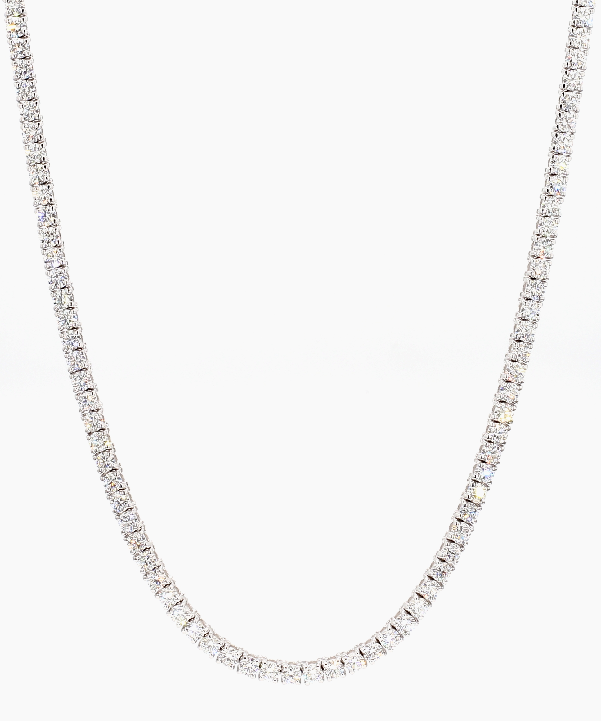 Gorgeous 10 Carat Diamond Tennis Necklace in F Color VS2 Clarity - 17 Inches. Adorn yourself with this radiant necklace. Shop Now.